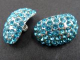 23mm Guziki ozdobne 1sztuka SREBRNE cyrkonie AQUA OZ41 nieregularny owalny guzik metalowy ze szklanymi cyrkoniami na stopce